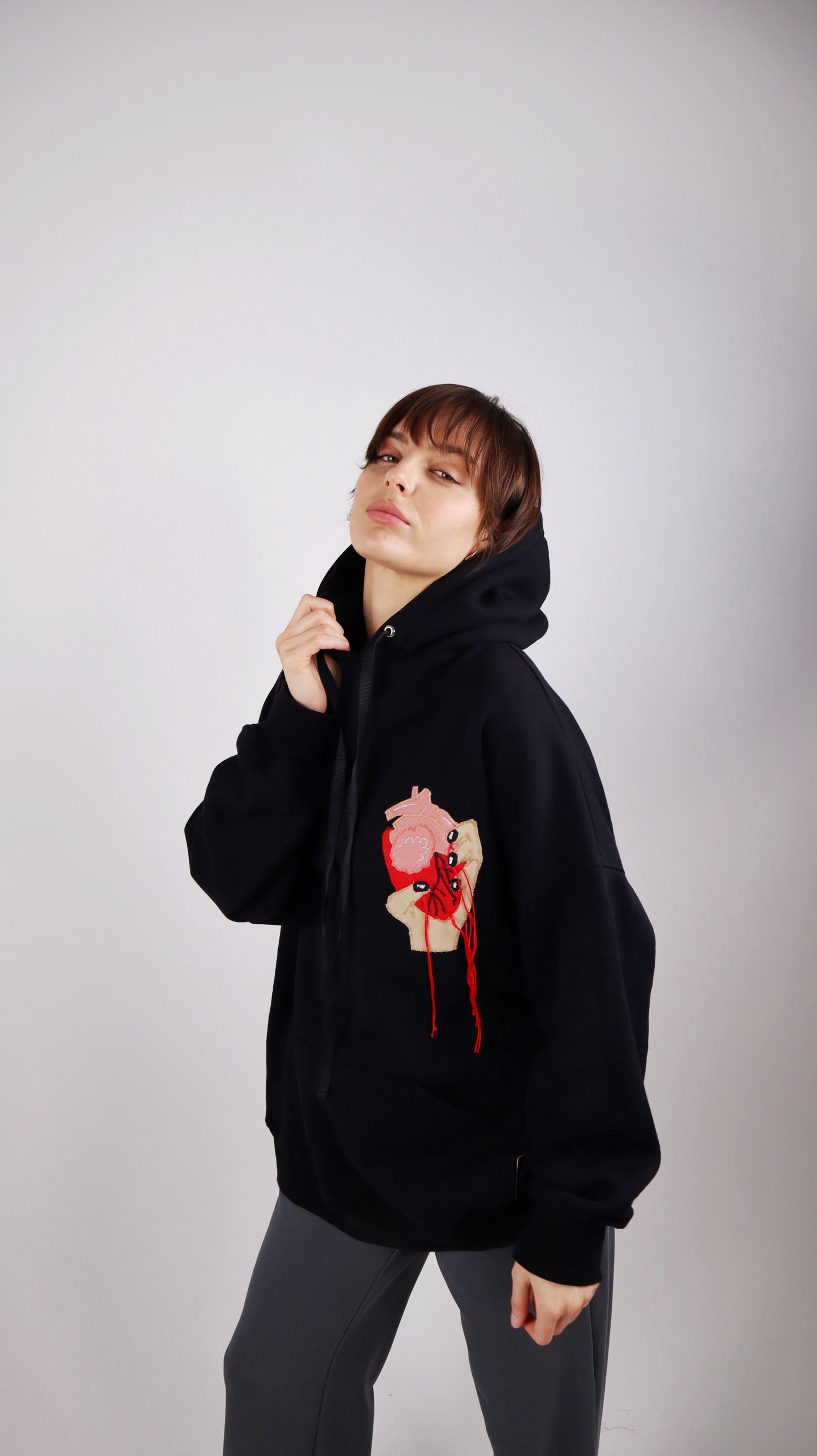 BLACK HOODIE WITH FABRIC APPLIQUÉ